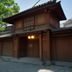 内容运营专家王建国头像，中年男性，格子衬衫，技术极客风格，黑板背景